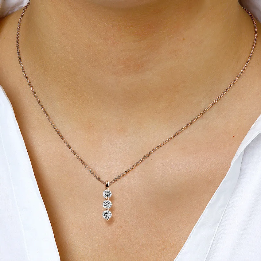 1.00 quilates trilogía colgante diamante en oro rojo 