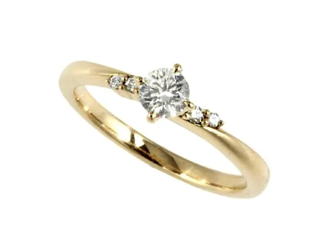 & Other Stories 18Anillo de diamantes K en excelentes condiciones Dorado 