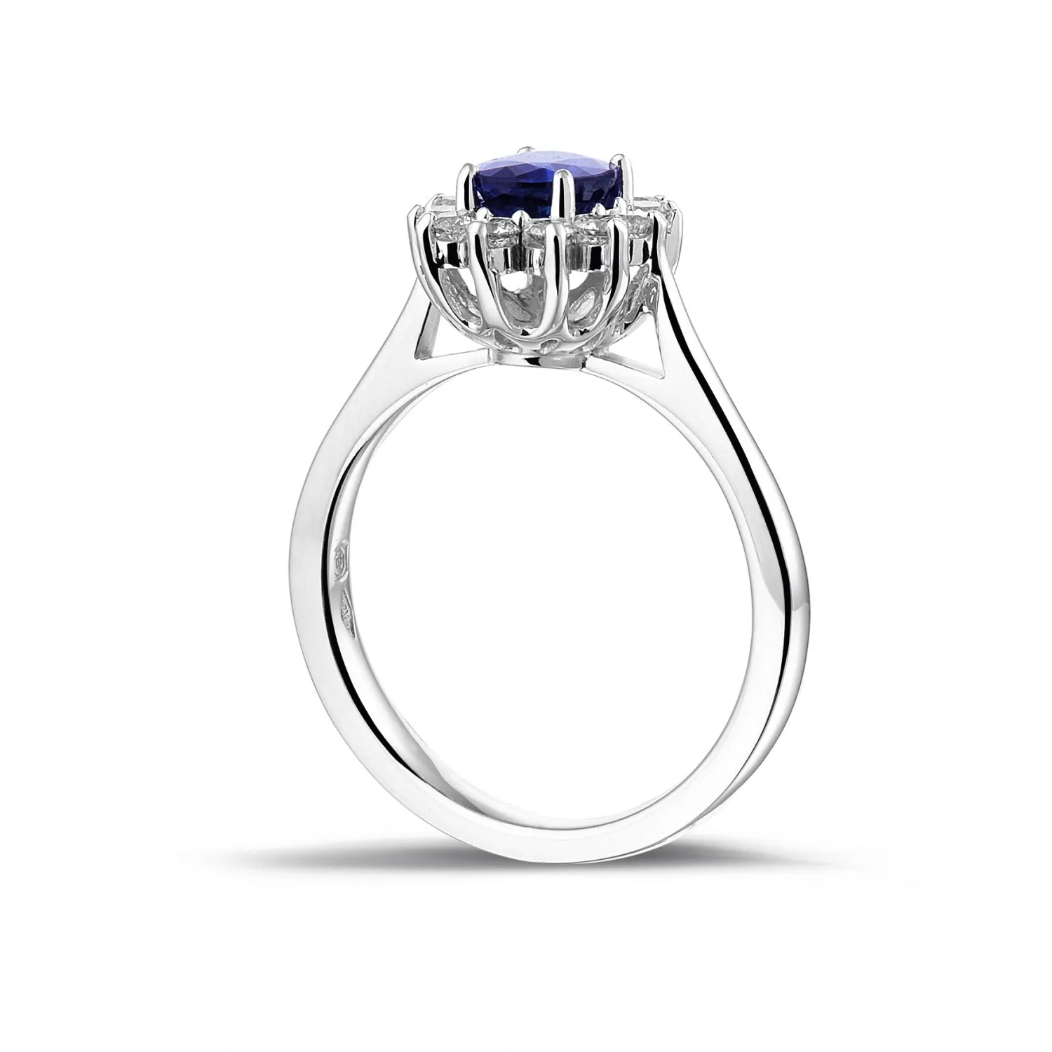 Anillo « entourage » en oro blanco con zafiro ovalado y diamantes redondos 