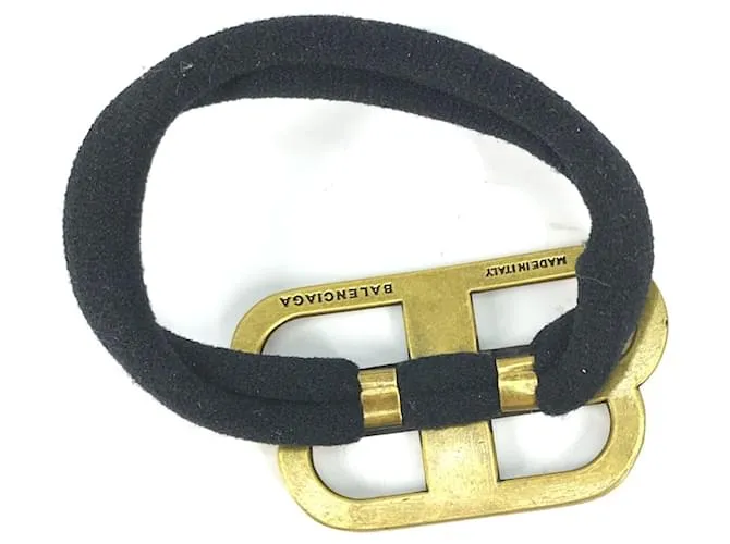 Balenciaga Cabello de Goma Dorado y Negro 