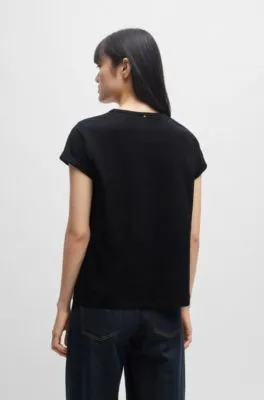 Camiseta de punto de algodón con puños enrollados
