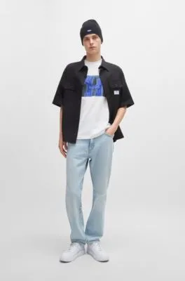 Camiseta regular fit de punto de algodón con ilustración de logo