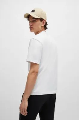 Camiseta relaxed fit de punto de algodón con estampado de cara