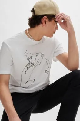 Camiseta relaxed fit de punto de algodón con estampado de cara
