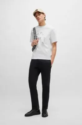 Camiseta relaxed fit de punto de algodón con estampado de cara