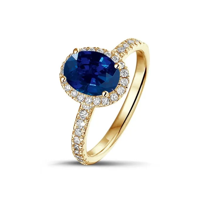 Halo anillo en oro amarillo con zafiro ovalado y diamantes redondos 