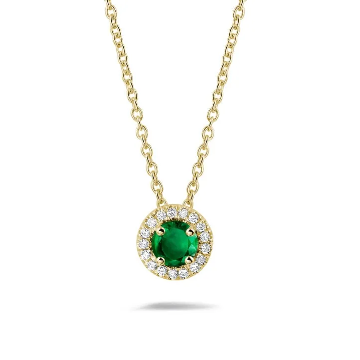 Halo colgante en oro amarillo con esmeralda central y diamantes redondos 