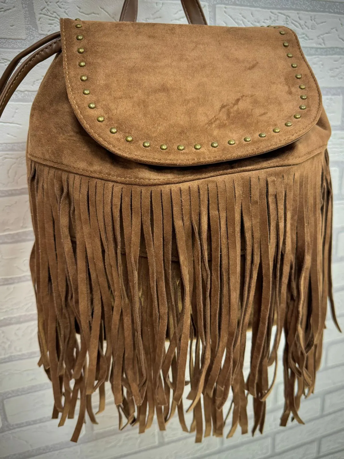 Mochila de flecos